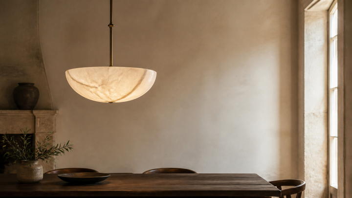 Warm Spanish alabaster pendant light in a refined dining interior