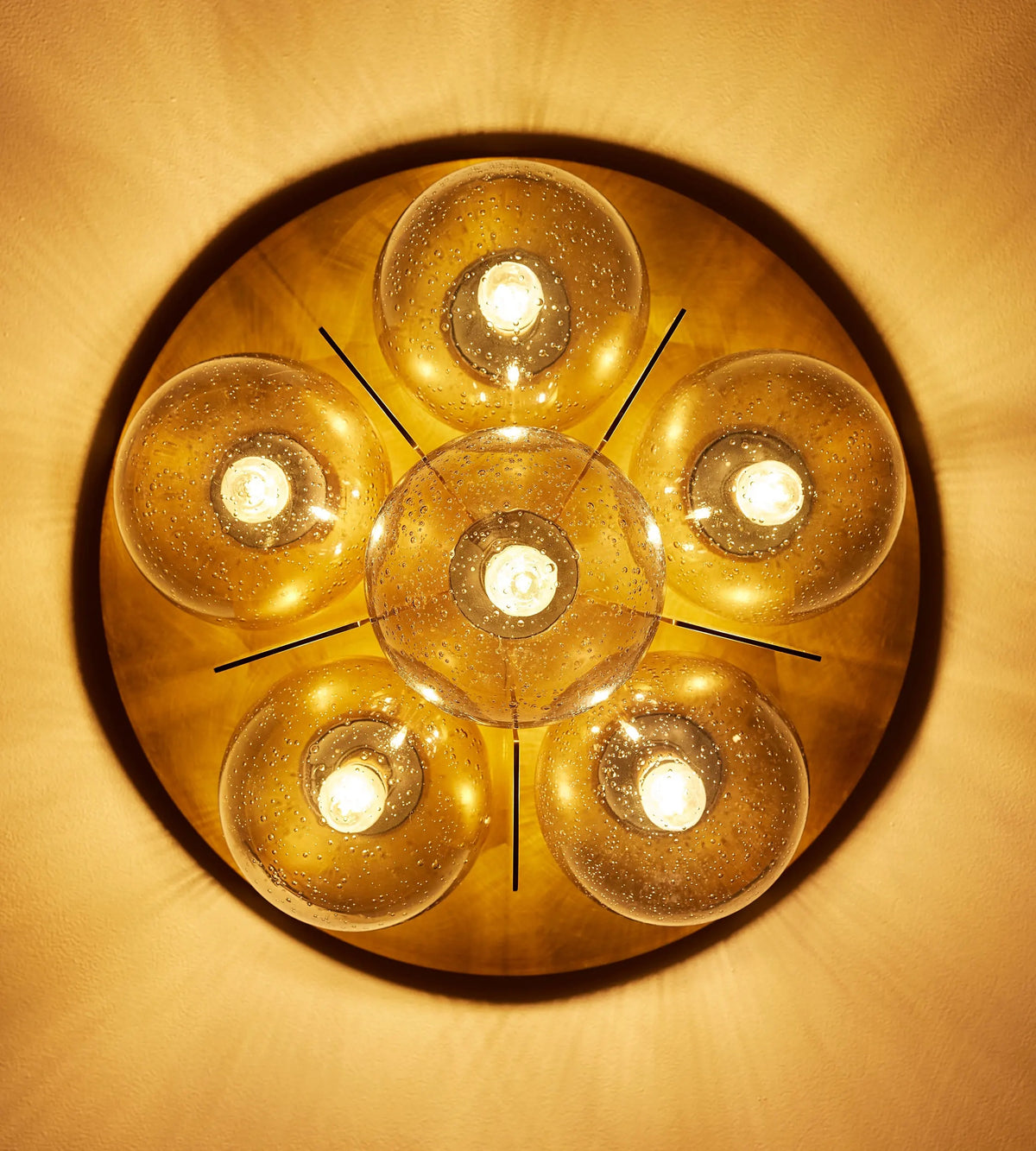 Underside view of Lois flush light with six bubble glass globes
