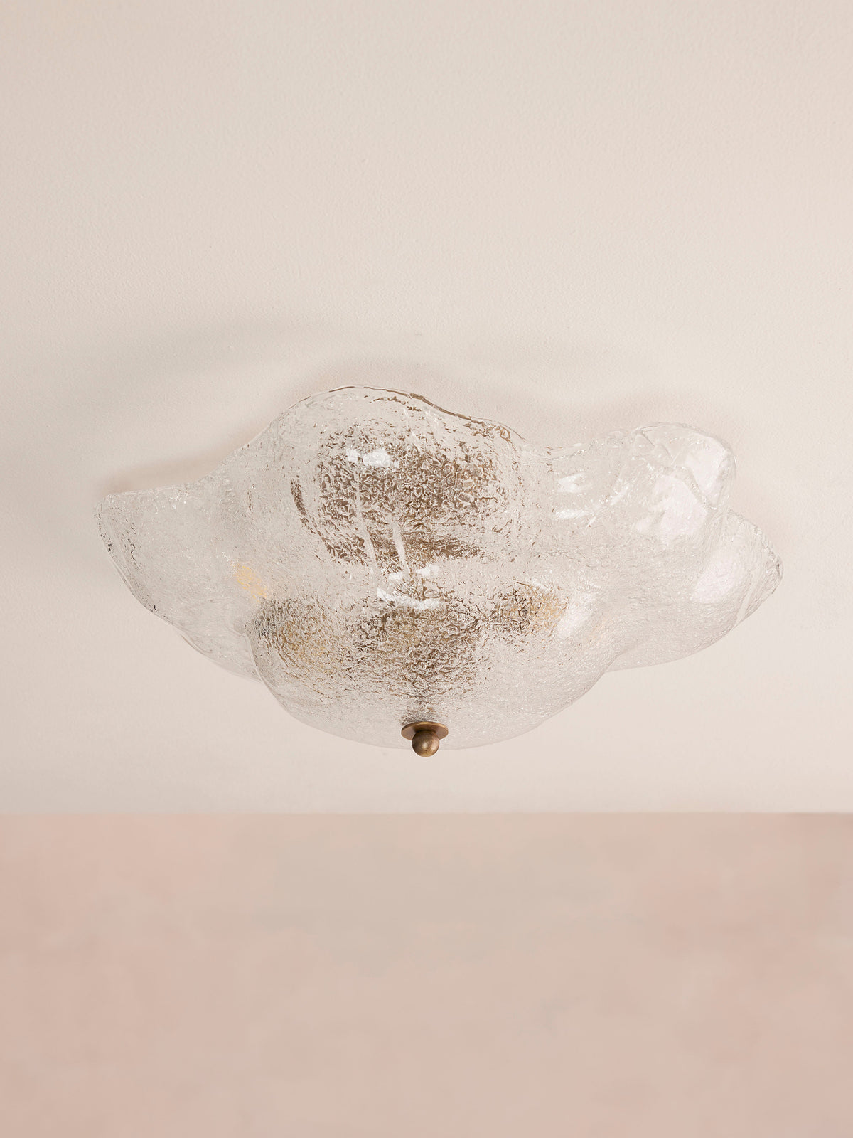 Flavia flush ceiling light front view with textured Venetian glass and brass details