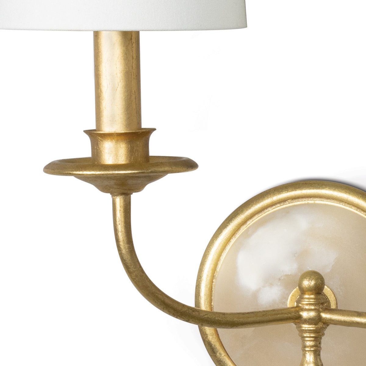 Close-up of the Fisher double sconce gold-leaf finish and linen shade