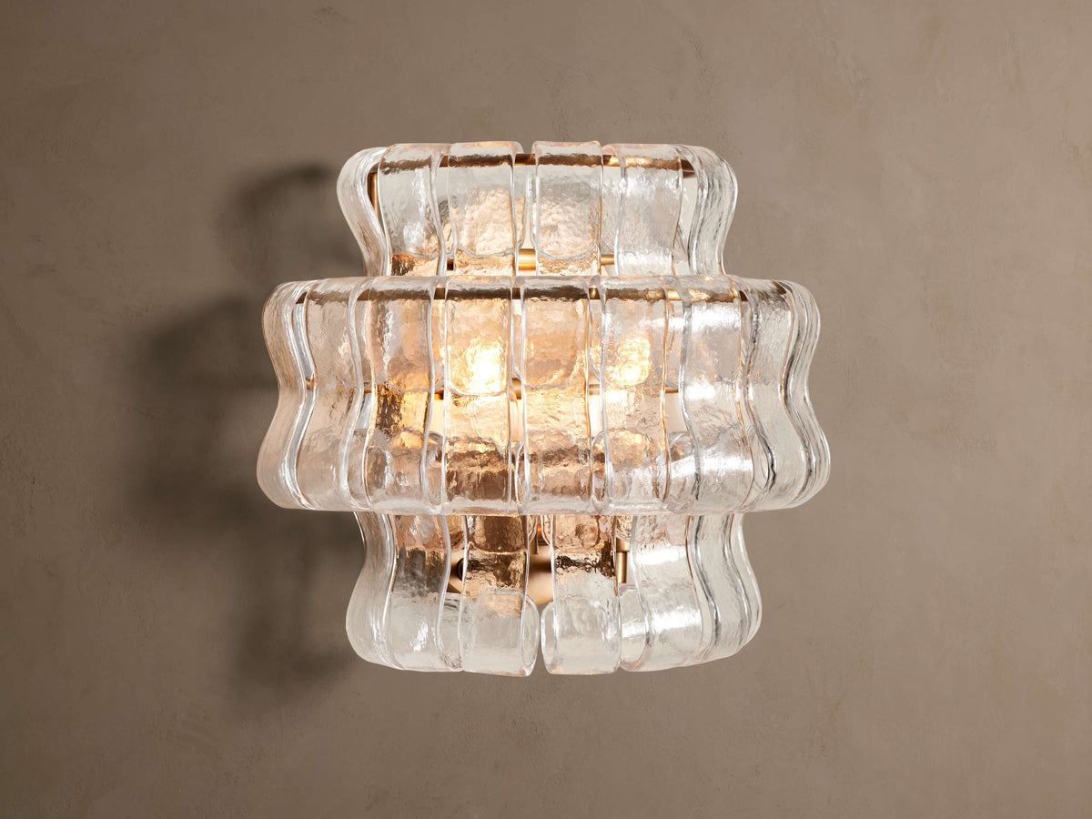 Ghiaccio wall sconce – Clear glass / Brass finish, illuminated front view