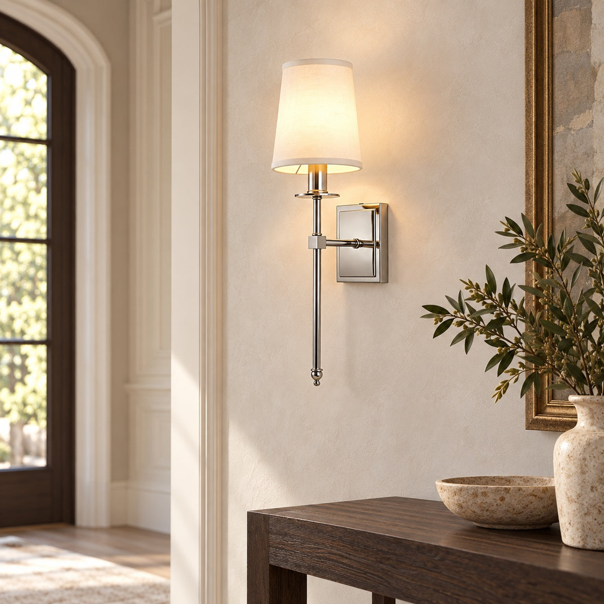 Polished nickel Belmont Fabric Sconce illuminating an entry hallway
