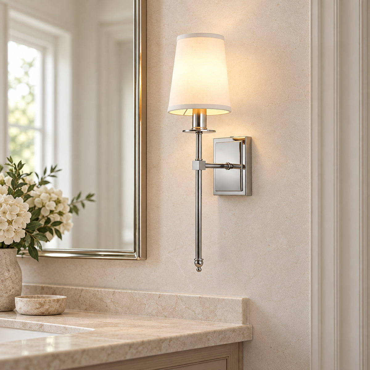 Polished nickel Belmont Fabric Sconce beside a powder room mirror