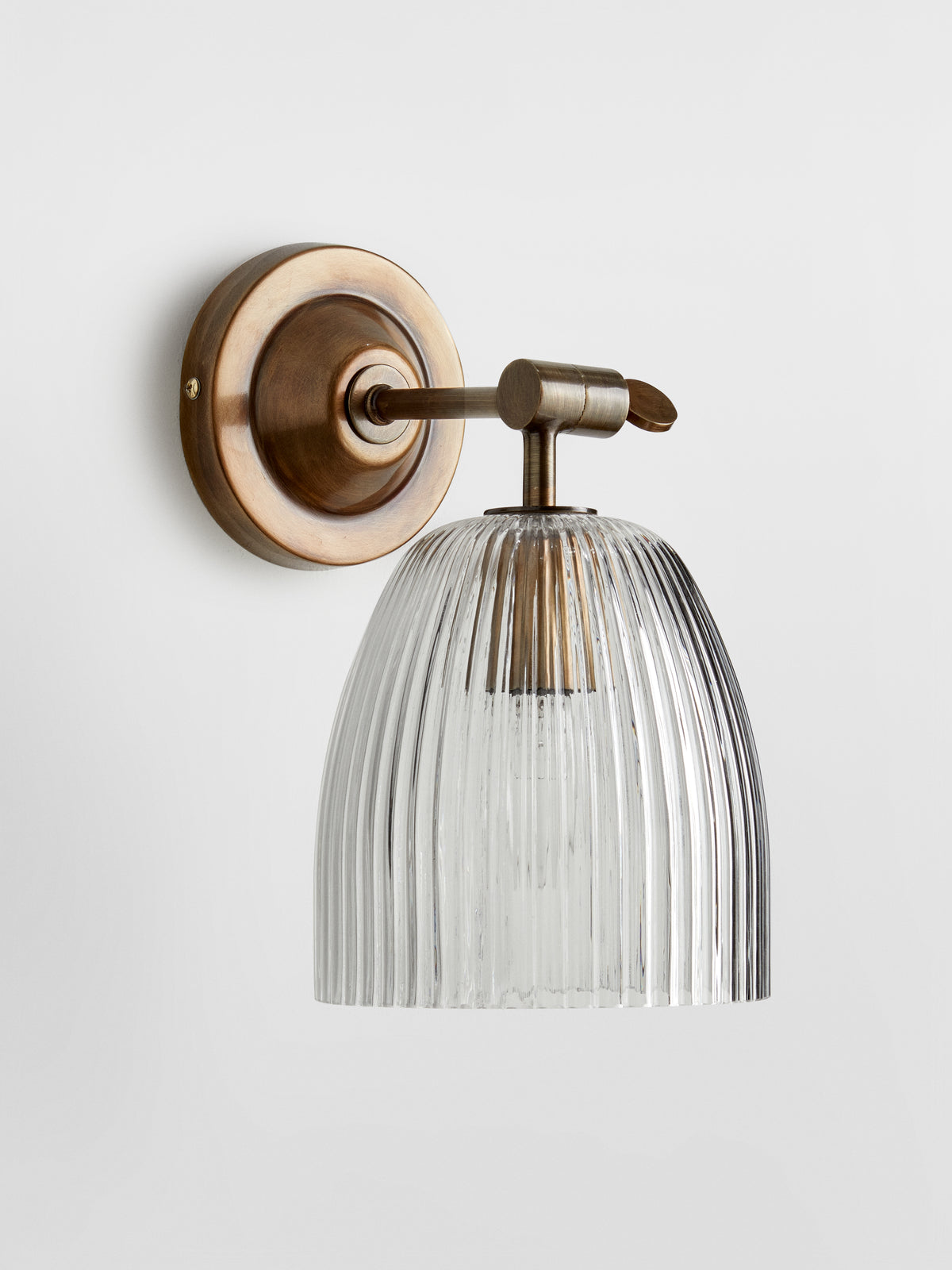 Benny wall sconce ribbed glass close-up