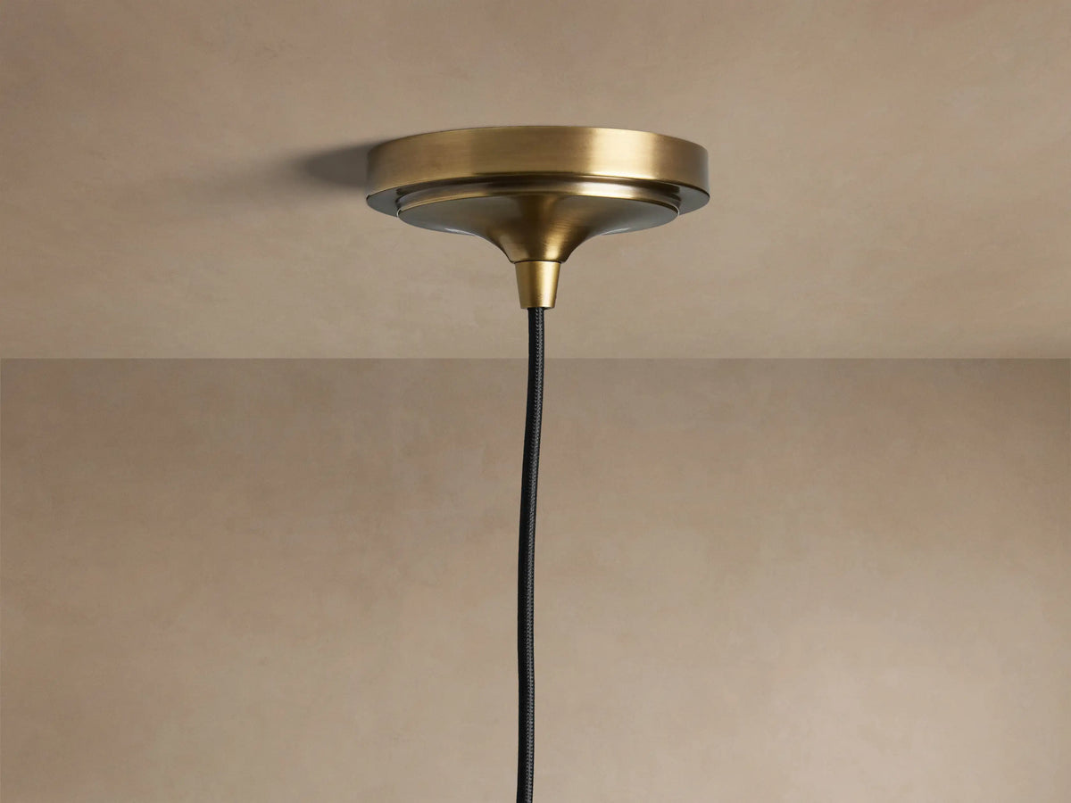 Canela pendant plated brass canopy and black fabric-wrapped cord