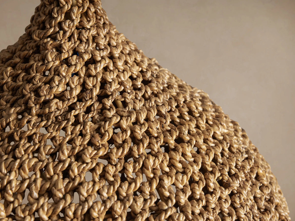Detail of the Canela pendant's handwoven banana rope shade