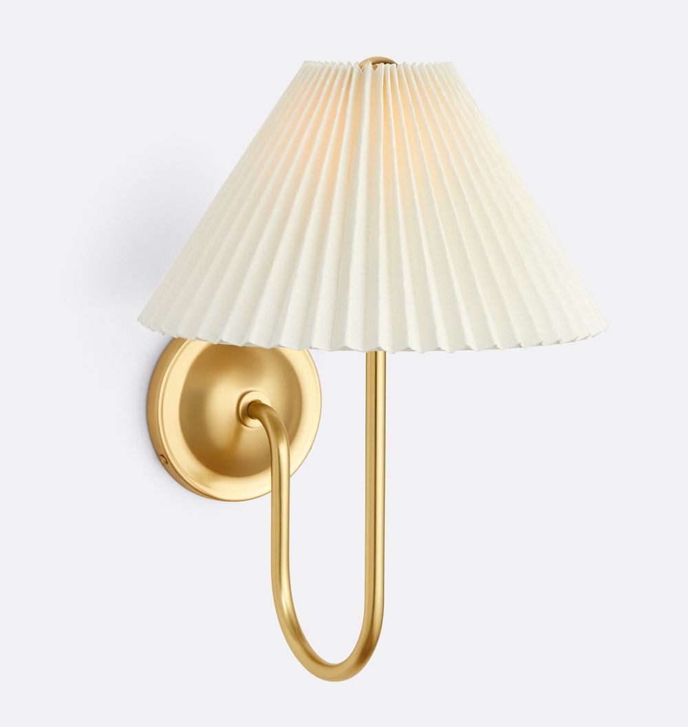 Crissey single sconce in Aged Brass with pleated fabric shade