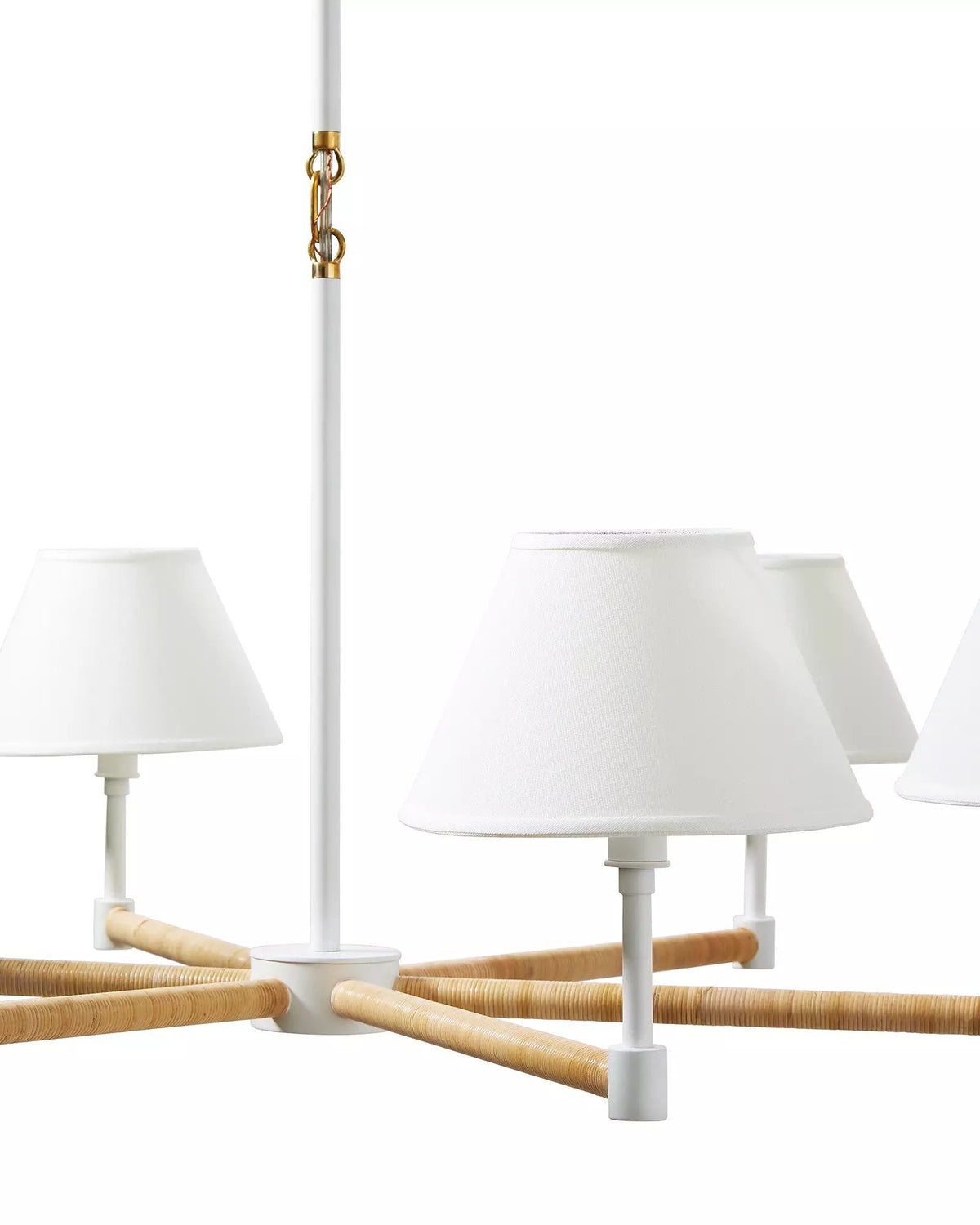 Larkspur white rattan chandelier shown in an interior