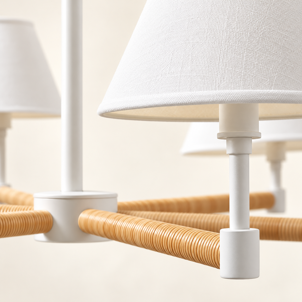 Close-up of natural rattan wrapping and white linen shade on Larkspur chandelier