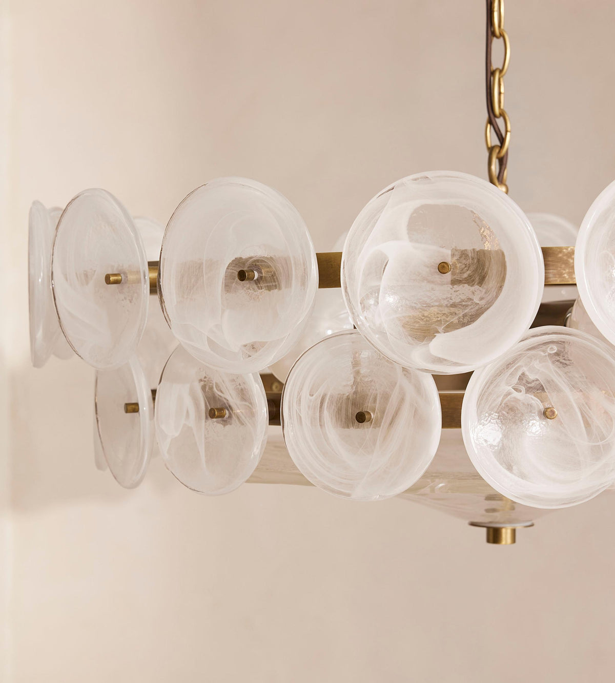 Lorenzo chandelier tiered glass disc detail