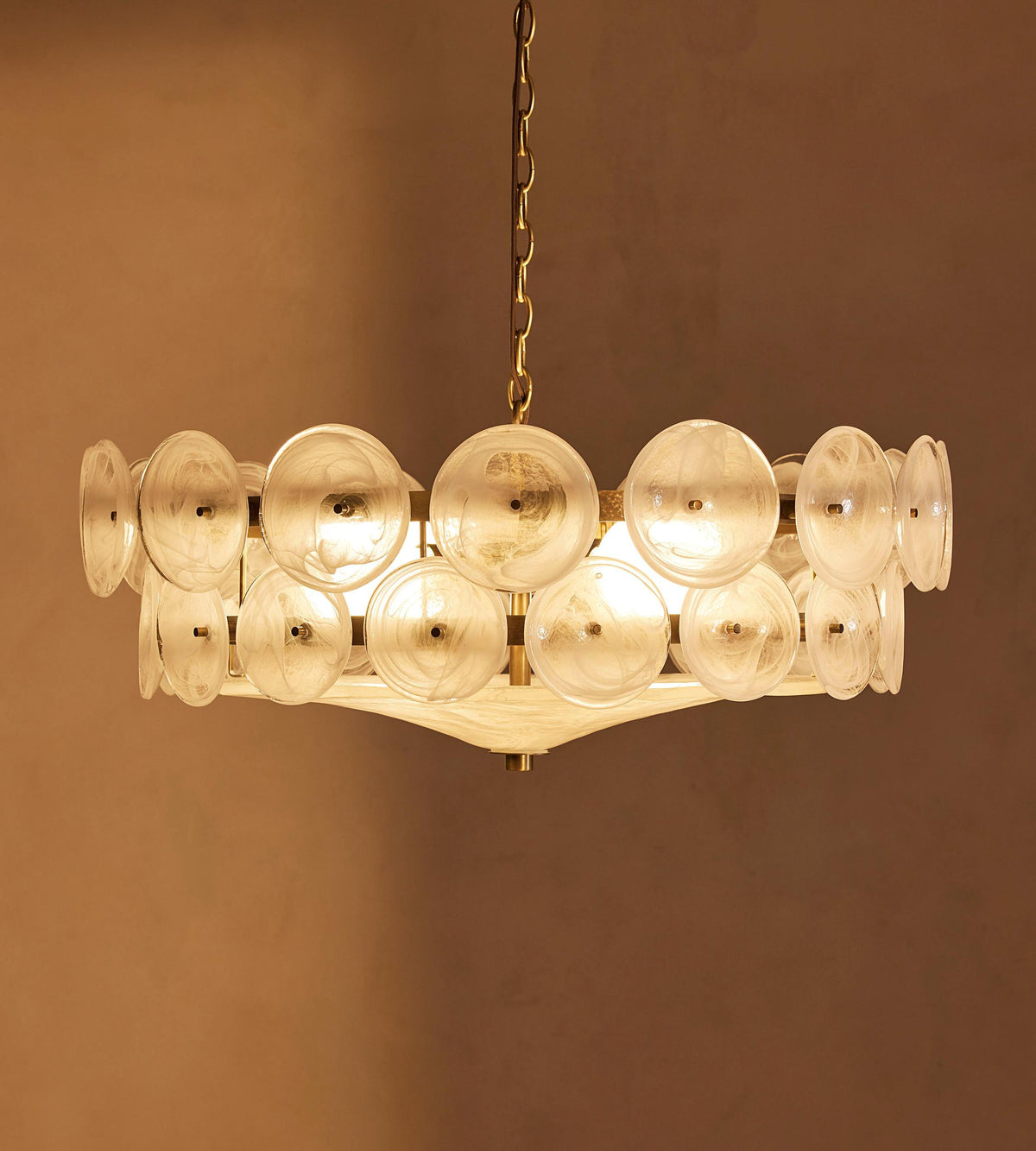 Lorenzo milky glass chandelier illuminated, front view
