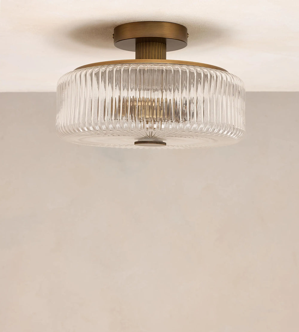 Renato flush mount ceiling light in antique brass and ribbed glass