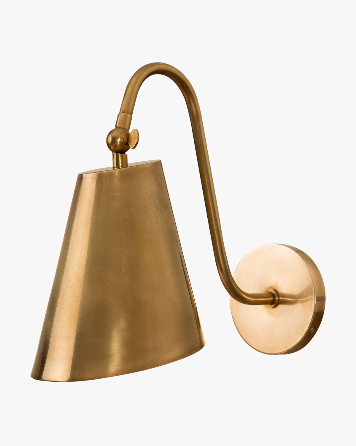 Saylor antique brass wall sconce with curved arm and tapered shade