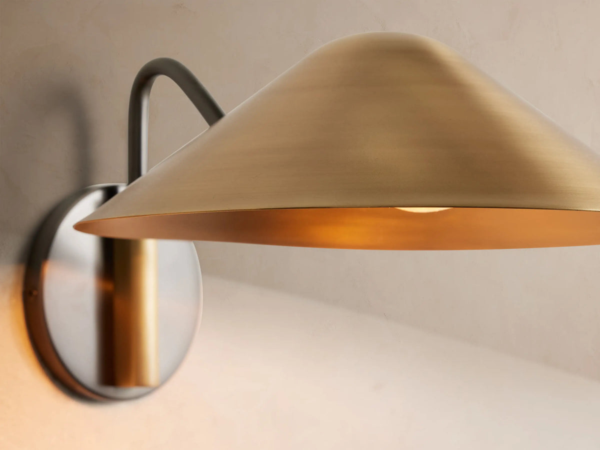 Close-up of Simms brass sconce shade and backplate