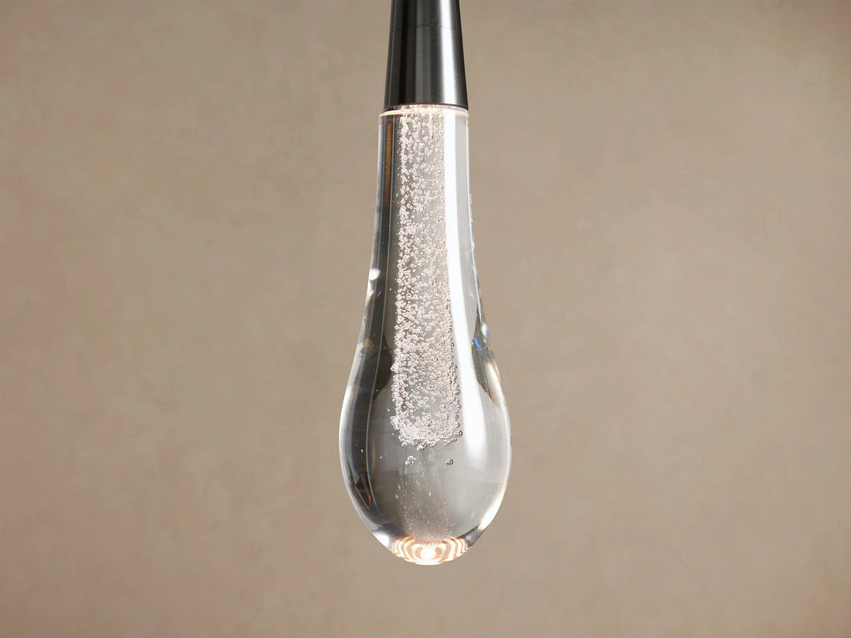 Close-up of Soltaire pendant seeded glass and LED light