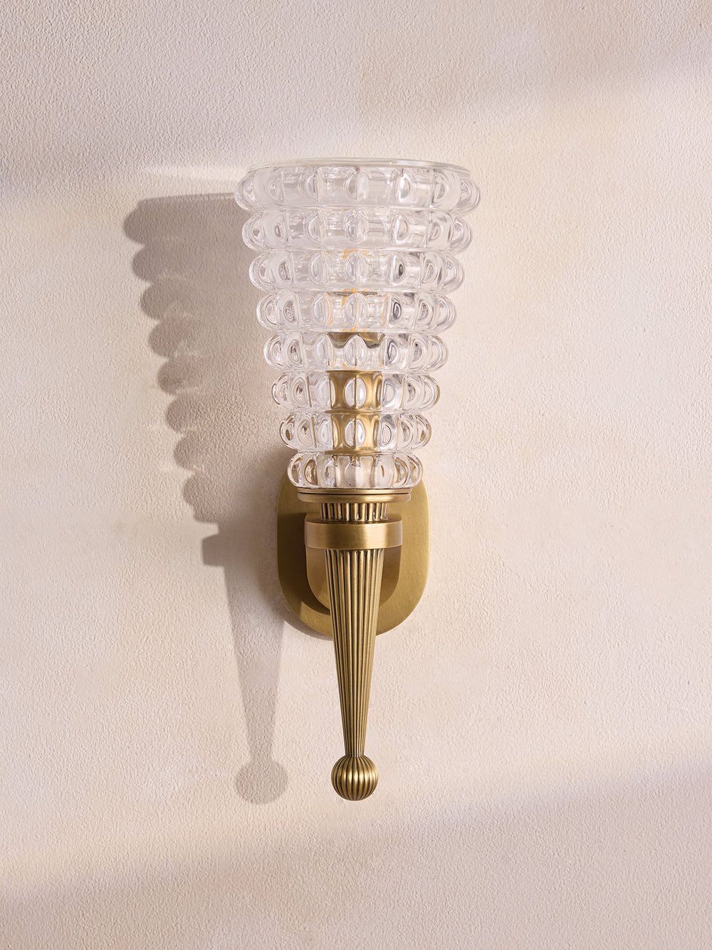 Valencia textured glass wall sconce front view