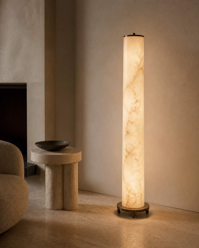 Illuminated alabaster floor lamp in a warm stone interior
